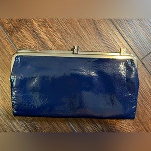 Hobo Lauren clutch w/ double kiss locks & large zip pocket. Brilliant blue.